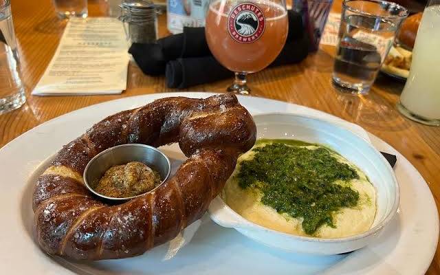 A soft pretzel and a glass of beer at the Deschutes Brewery public house