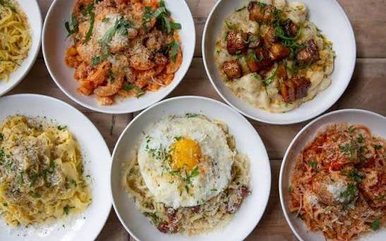 Bowls of fresh pasta seen from above