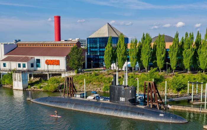OMSI on the east bank of the Willamette with the submarine USS Blueback moored alongside