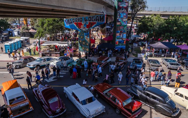 Painted bridge pylons and lowriders at Chicano Park in Barrio Logan