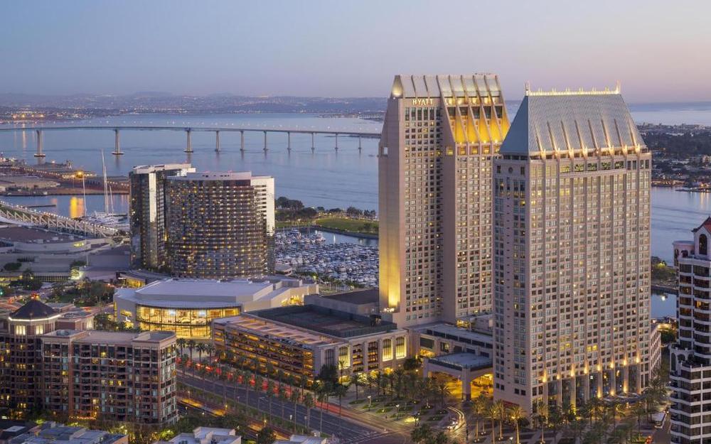 The two towers of the Manchester Grand Hyatt on the San Diego waterfront at dusk
