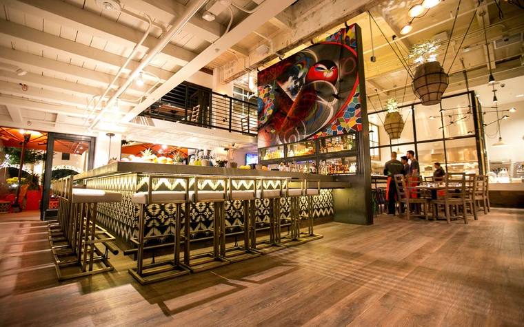 The bar and dining room inside Puesto at the Headquarters